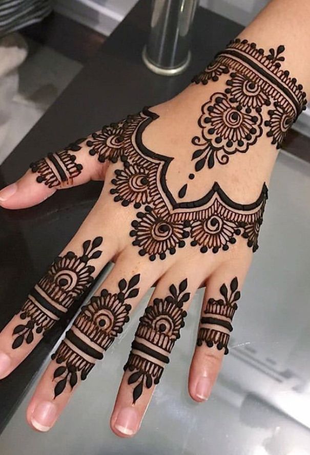 Flowers are a popular motif in henna designs. Roses, lotuses, and daisies are commonly used.