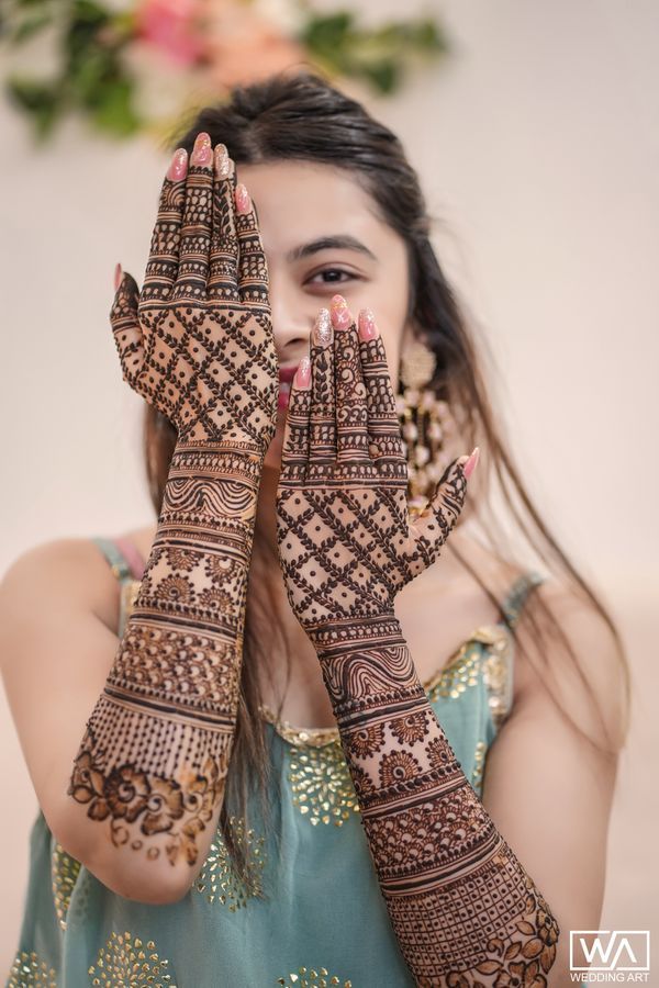 A Pinkish Wedding With Floral Mandap & A Charming Bride