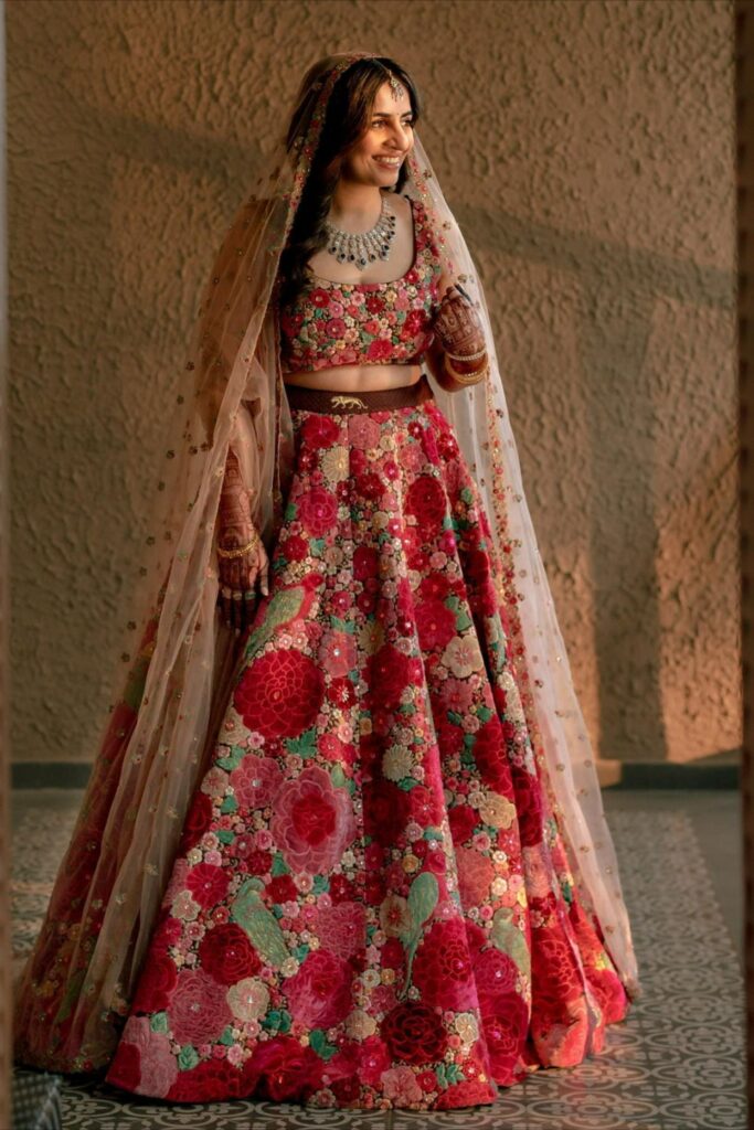 Bride in a floral Sabyasachi lehenga