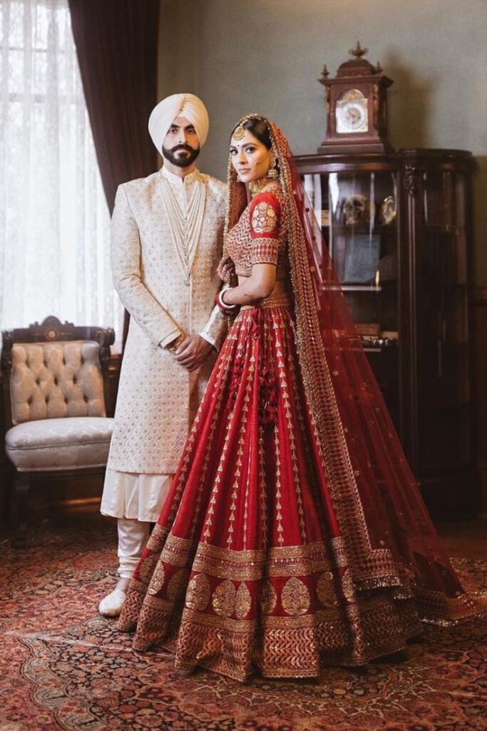 Bride in a red lehenga for a Sikh wedding