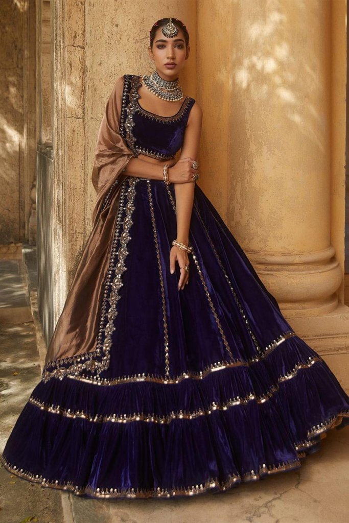 Buy Blue Velvet Dupatta Tissue Embroidery U Neck Bridal Lehenga Set For Women by Vvani by Vani Vats Online at Aza Fashions.