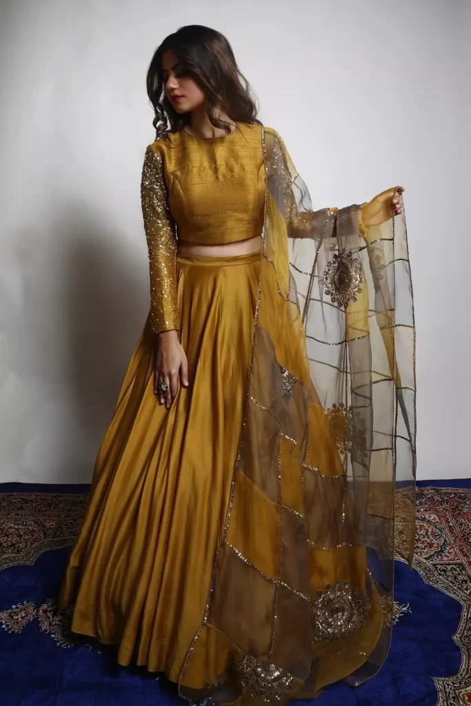 Buy Gold Lehenga And Blouse Dupion Silk Embroidered Zari Round Neck Set For Women by Mona and Vishu Online at Aza Fashions.