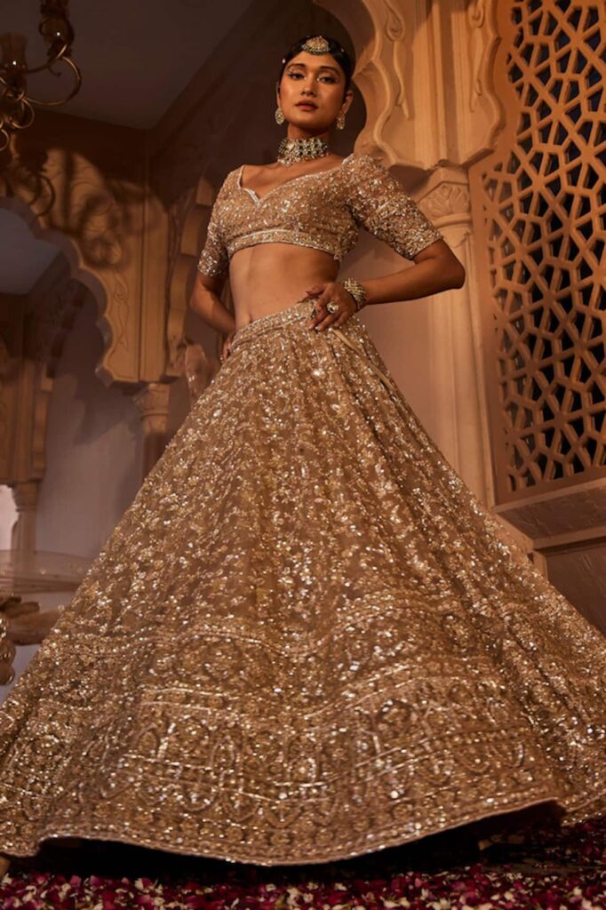 Buy Gold Organza Hand Embroidered Thread And Zarin Bridal Lehenga Set For Women by Kalighata Online at Aza Fashions.