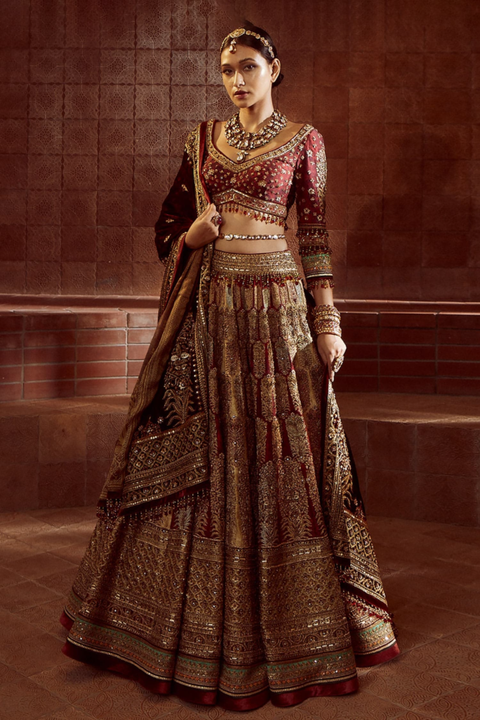 Buy Maroon Lehenga And Blouse Silk Dupion Hand Embroidered Bridal Set For Women by Tarun Tahiliani Online at Aza Fashions.