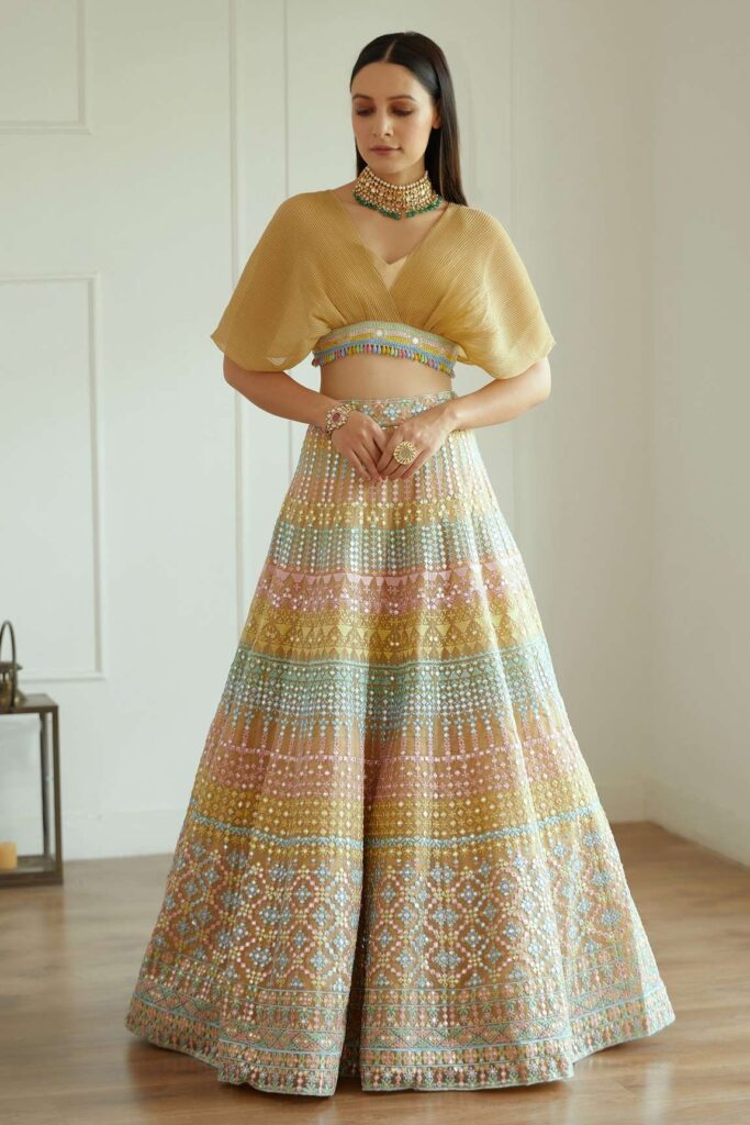Buy Multi Color Organza Embroidered Mirror Work Meher Choli And Lehenga Set For Women by Studio Iris India Online at Aza Fashions.