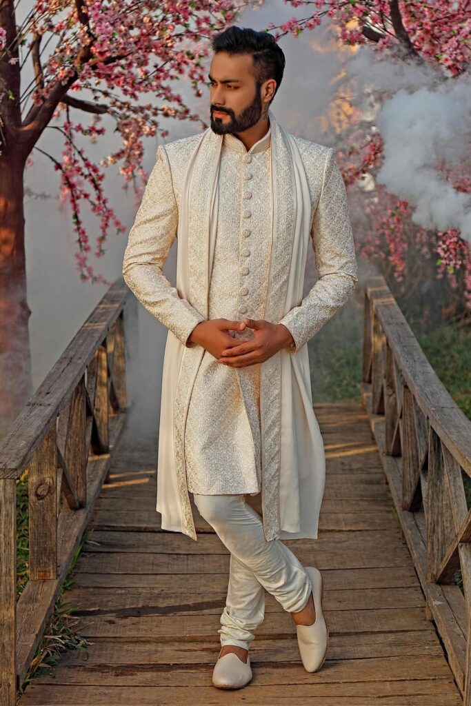 Buy White Raw Silk Embroidered Sherwani Set For Men by Vanshik Online at Aza Fashions.