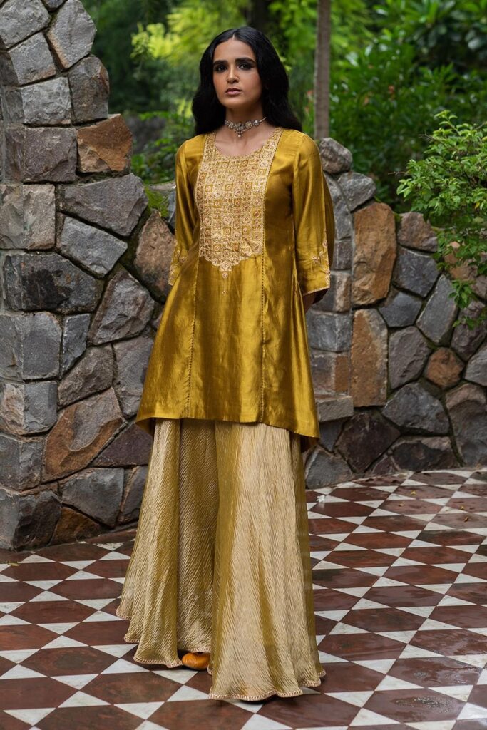 Buy Yellow Silk Embroidery Floral Round Yoke Kurta Sharara Set For Women by Deep Thee Online at Aza Fashions.