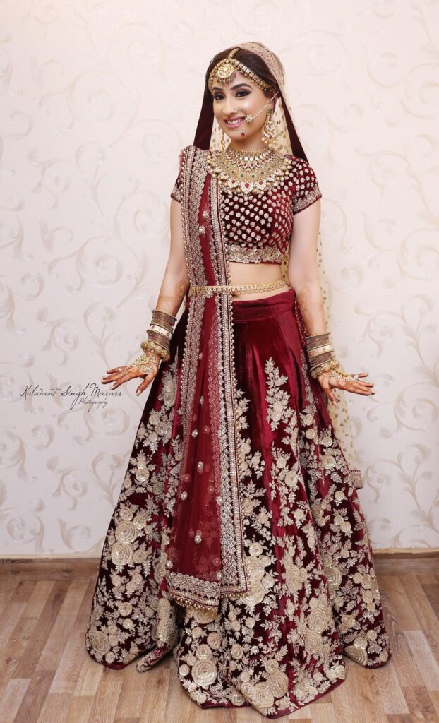 Photo of Marsala wedding lehenga with floral zardozi work