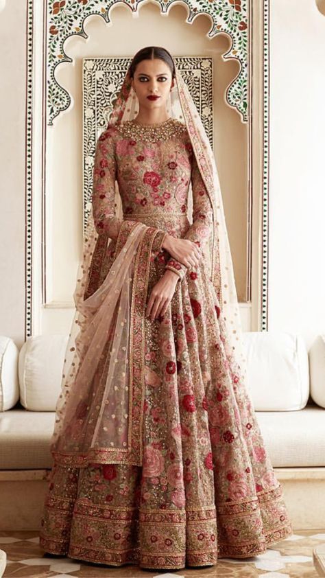 Photo of Pomegranate pink bridal lehenga