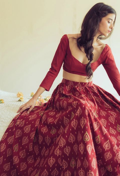 red batik printed cotton lehenga with full sleeves and scoop deep necklines