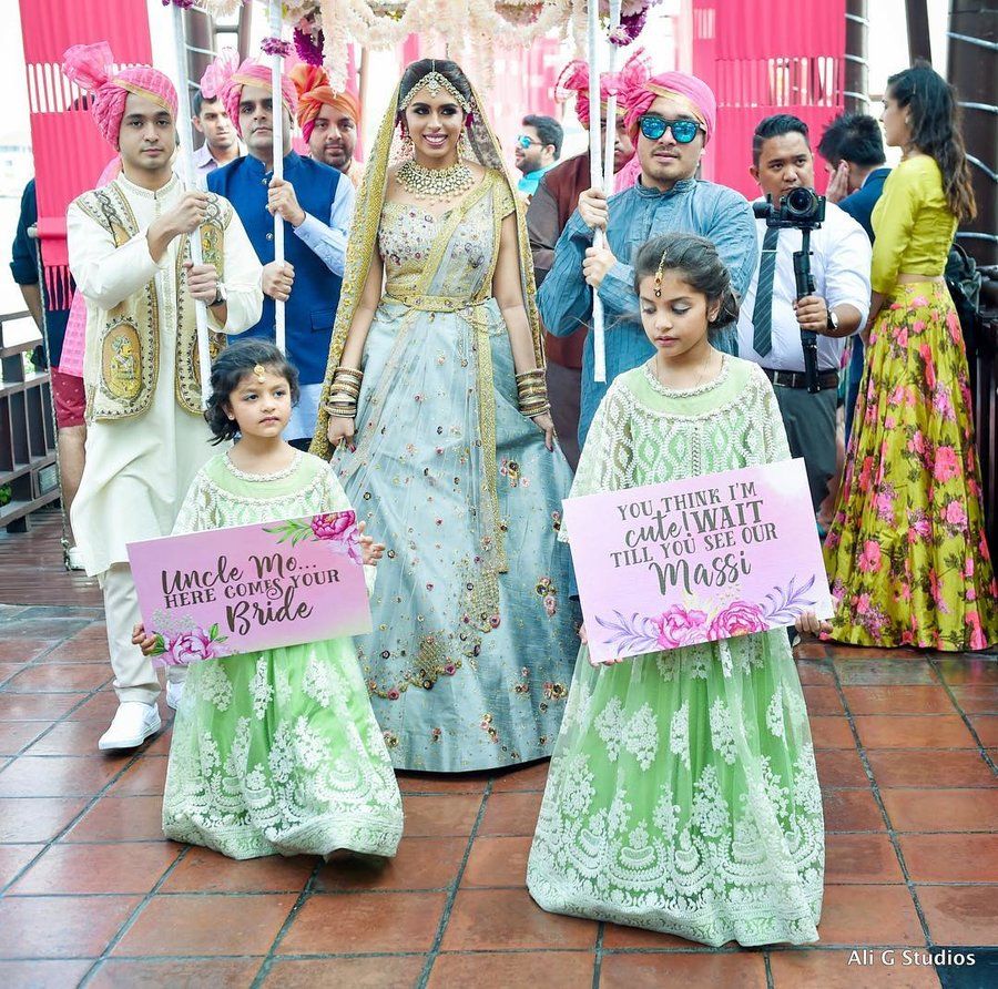 14 ‘Here Comes the Bride’ Photo Ideas for an Adorable Bridal Entry