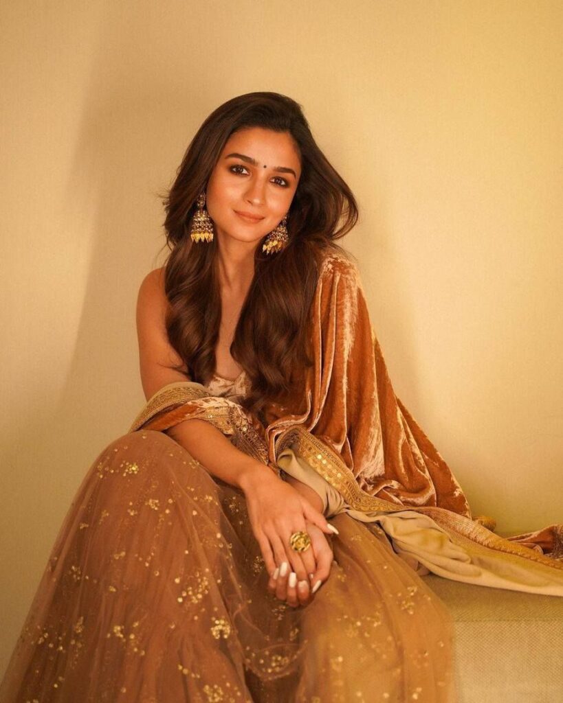 Alia Bhatt glams up in a gold lehenga set for “RRR” promotions!