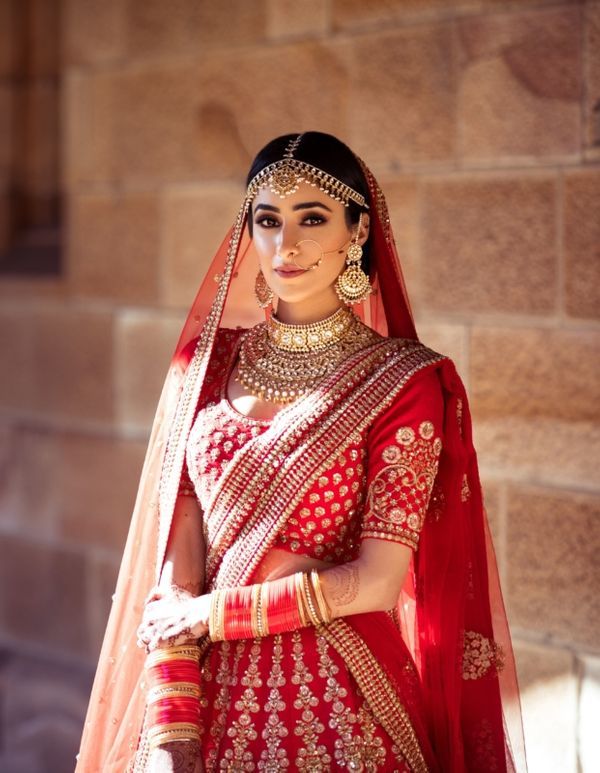 An Elegant Anand Karaj With The Bride In Vibrant Outfits