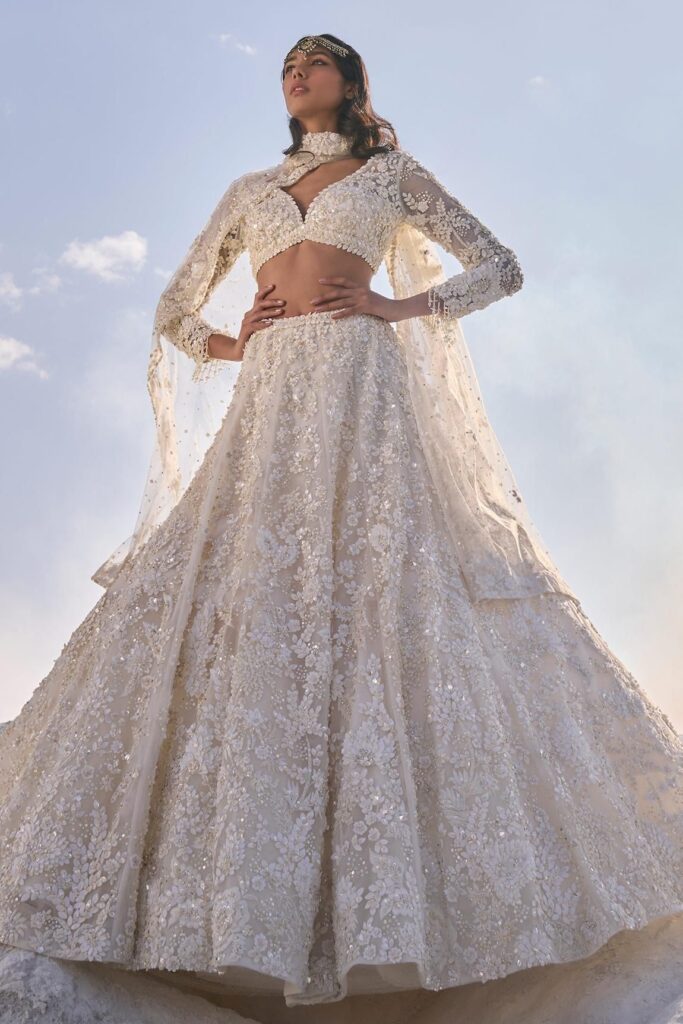 Buy Cream Net Embroidery Fabric Sweetheart 3d Floral Bridal Lehenga Set For Women by Seema Gujral Online at Aza Fashions.