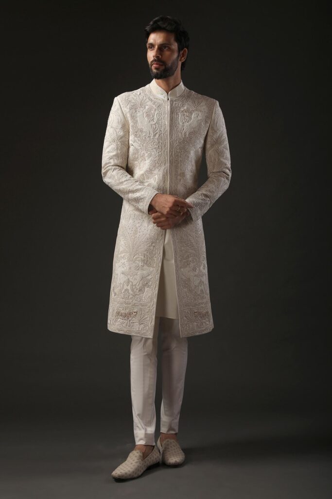 Buy Ivory Matka Silk Embroidered Resham Sherwani For Men by Rohit Bal Online at Aza Fashions.