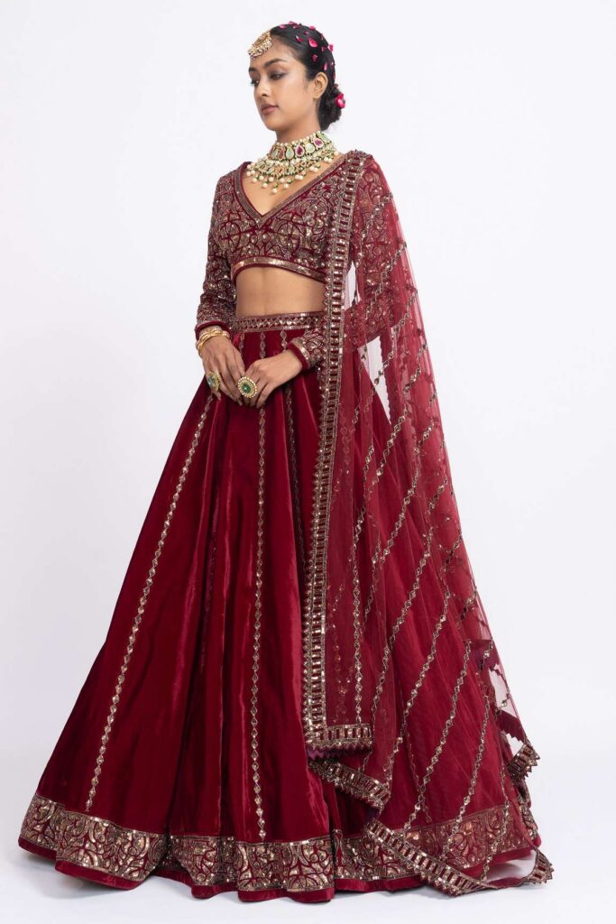 Buy Maroon Velvet Dupatta Net Embroidery V Neck Bridal Lehenga Set For Women by Vvani by Vani Vats Online at Aza Fashions.