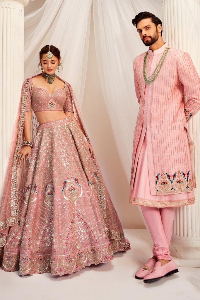 Buy Pink Raw Silk Embroidered Glass Sequin And Dabka Bridal Lehenga Set For Women by Rachit Khanna Online at Aza Fashions.