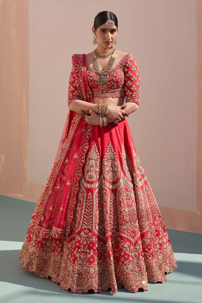 Buy Red Raw Silk Embroidered Zardozi Plunge Neck Bridal Lehenga Set For Women by Angad Singh Online at Aza Fashions.