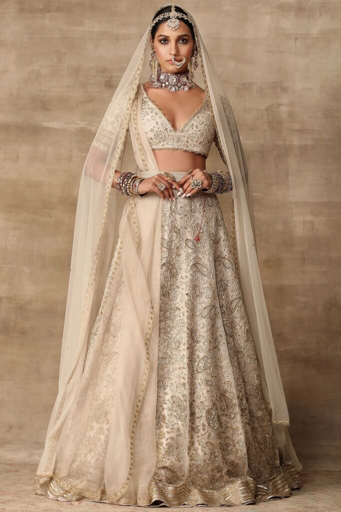 Buy White Net V Neck Embroidered Bridal Lehenga Set For Women by Ridhi Mehra Online at Aza Fashions.