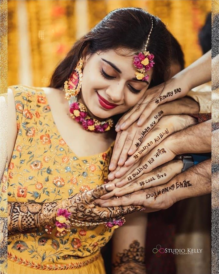 Check out the latest mehendi designs & don’t forget to save it for later! | Wedding photoshoot props, Bridal photography poses, Bride photography poses