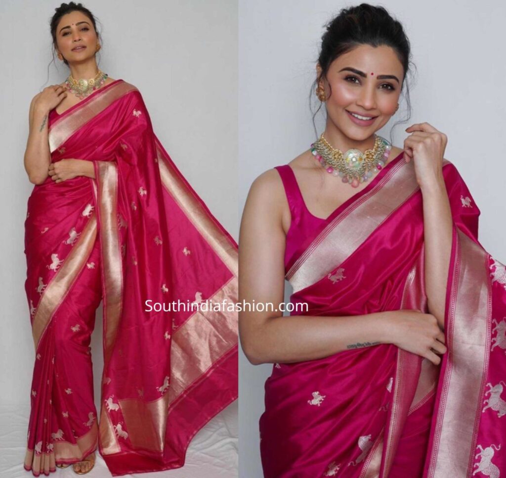 Daisy Shah dazzles in a bright pink banarasi silk saree