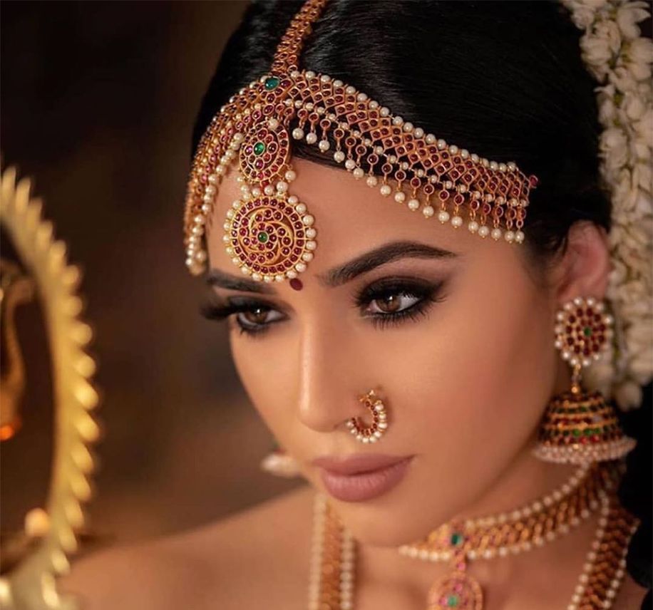 Elaborate pearl and gold bridal jewelry set