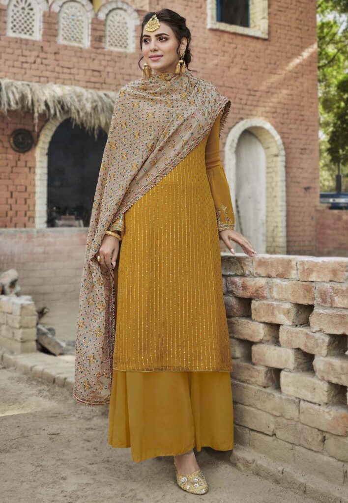 Embroidered Georgette Pakistani Suit in Mustard