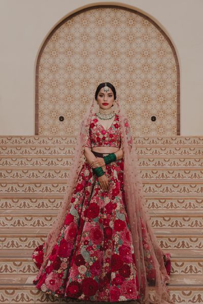 Gold glass beads red lehenga by Chamee and Palak