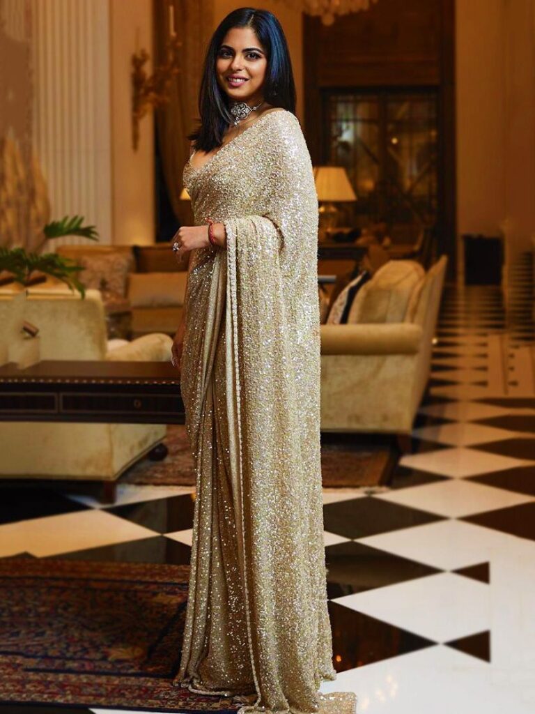 Isha Ambani In Sabyasachi Golden Sequins Georgette Party Wear Saree