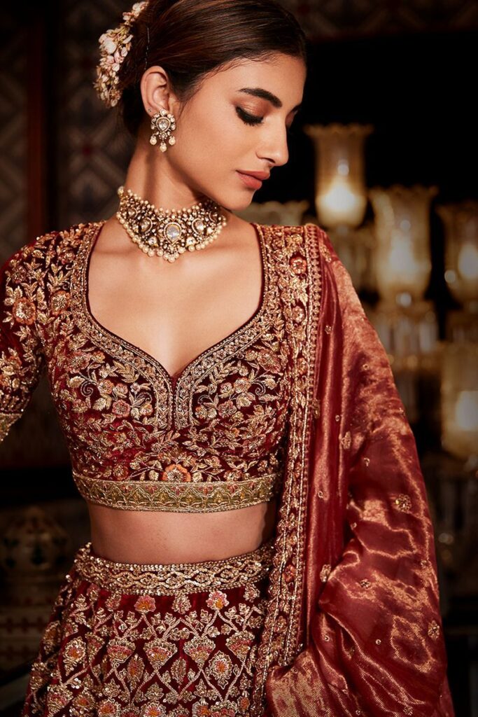 Maroon velvet zardozi handwork lehenga by Asopalav