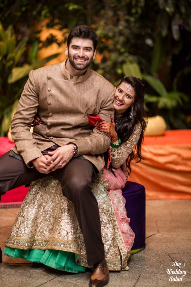 Nikitin & Kratika Had An Arranged Marriage; Kratika Had Royal Bridal Look In Red Pink Orange Lehenga