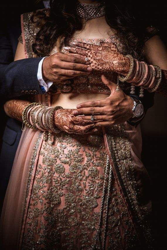 Photo of Romantic couple shot showing off rings