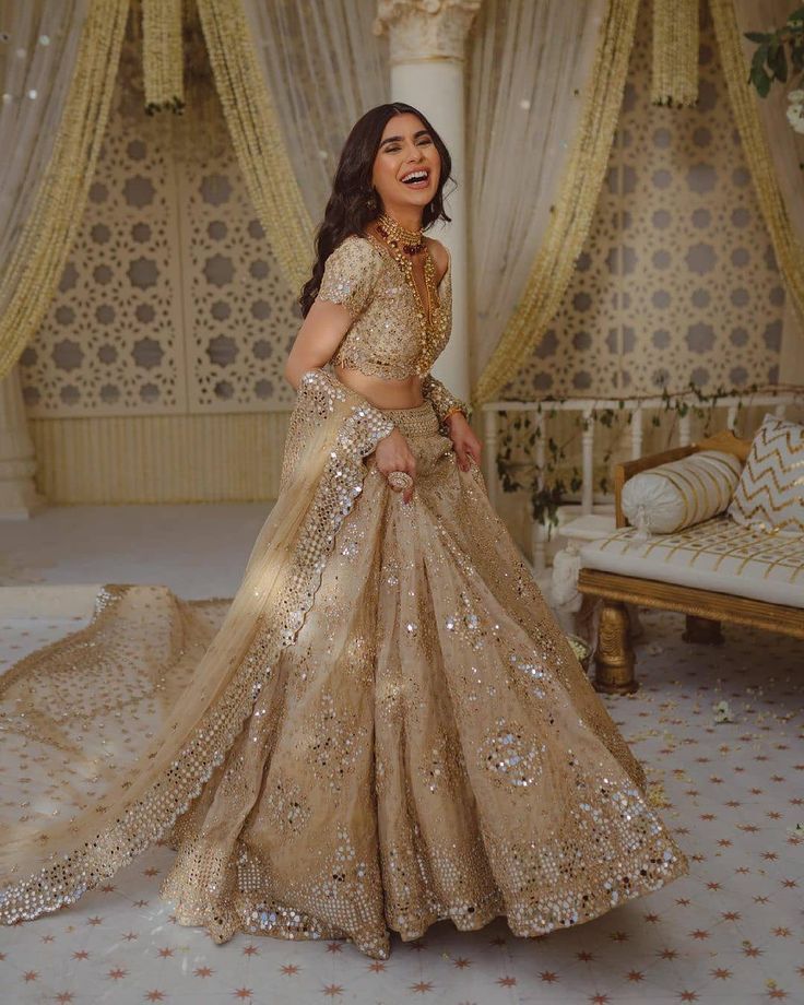 Stunning Bridal Golden Lehenga with Sheesha and Gota