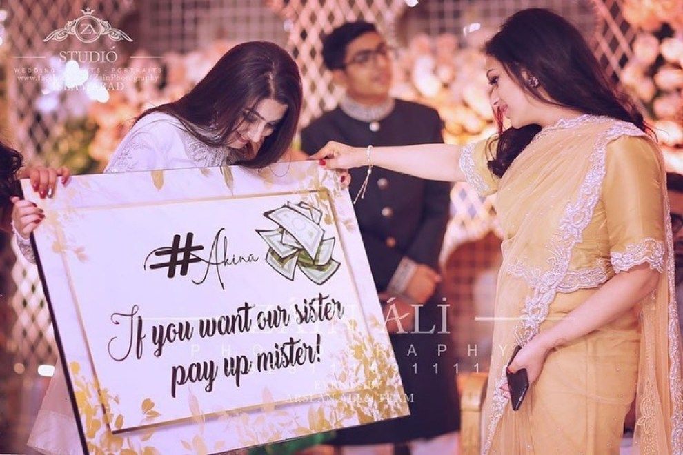 funny ideas to welcome a groom at baarat entry for bridesmaids!